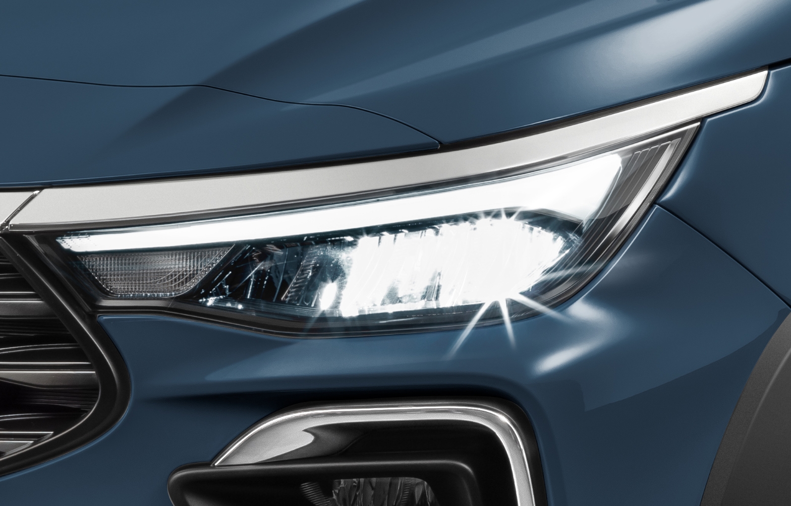 Visão dianteira do Fiat Pulse na cor azul, mostrando o design do farol.